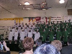 Graduation-31-20040529-WholeClass-PuttingTassleToTheRight.jpg